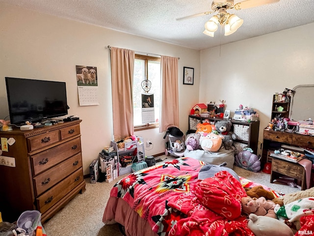 1666 Outrigger Rd, Galesburg, IL 61401 - carpeted bedroom featuring a textured ceiling and ceiling fan