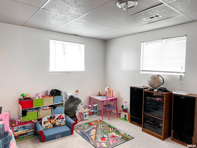 1666 Outrigger Rd, Galesburg, IL 61401 - recreation room featuring carpet flooring and a drop ceiling