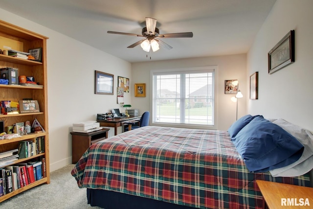 4619 Trinity Lakes Dr, Quincy, IL 62305 - carpeted bedroom featuring a ceiling fan and baseboards