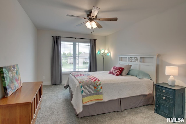 4619 Trinity Lakes Dr, Quincy, IL 62305 - carpeted bedroom with a ceiling fan