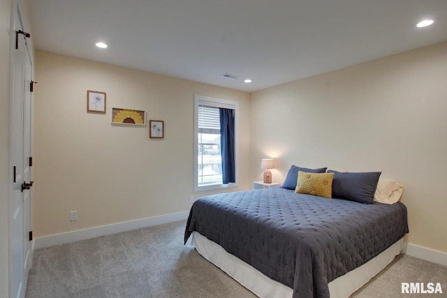 4619 Trinity Lakes Dr, Quincy, IL 62305 - carpeted bedroom featuring baseboards and recessed lighting