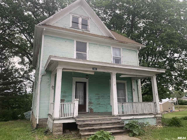 545 Bainbridge St, Barry, IL 62312 - american foursquare style home with a porch