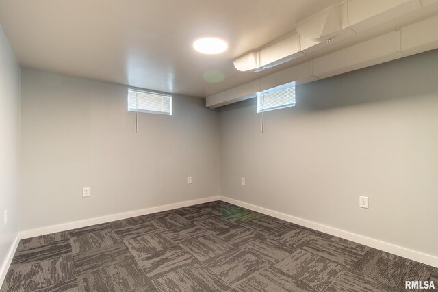 1520 W Losey St, Galesburg, IL 61401 - basement featuring healthy amount of natural light, baseboards, and dark colored carpet