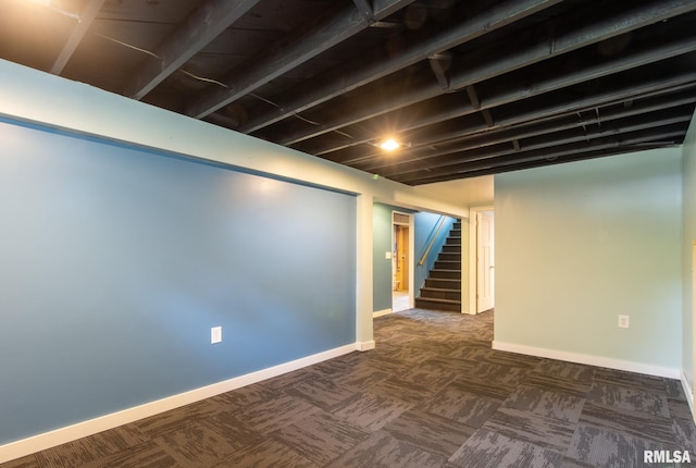 1520 W Losey St, Galesburg, IL 61401 - finished below grade area featuring stairs, baseboards, and dark carpet