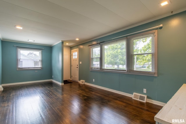 1520 W Losey St, Galesburg, IL 61401 - foyer featuring ornamental molding, wood-type flooring, and baseboards