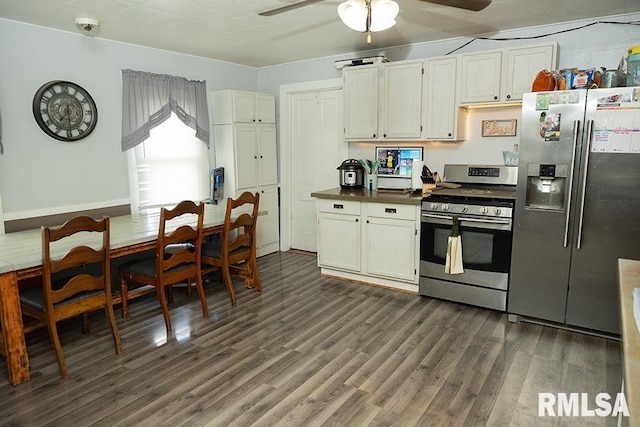 607 E 3rd St, Kinmundy, IL 62854 - kitchen with stainless steel appliances, ceiling fan, dark wood-style floors, and dark countertops