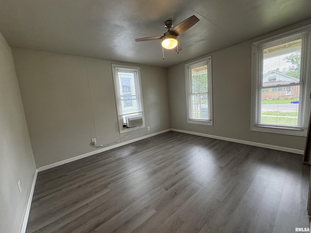 1248 N Ledlie Ave, Springfield, IL 62702 - spare room featuring plenty of natural light, a ceiling fan, dark wood finished floors, and baseboards