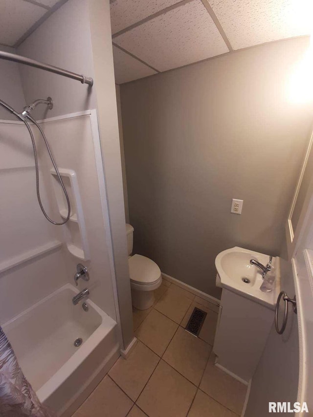 1312 N 3rd St, Springfield, IL 62702 - full bathroom with tile patterned floors, vanity, tub / shower combination, toilet, and baseboards