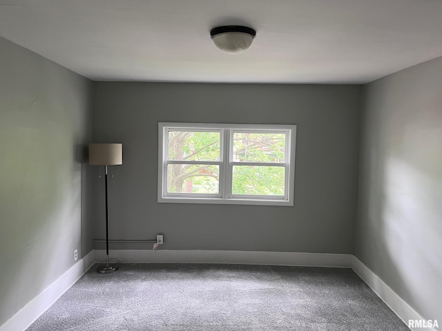 1312 N 3rd St, Springfield, IL 62702 - carpeted spare room with baseboards