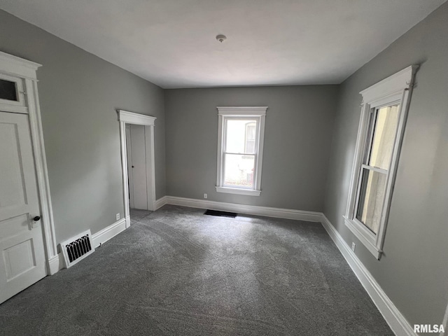 1312 N 3rd St, Springfield, IL 62702 - unfurnished bedroom with carpet and baseboards