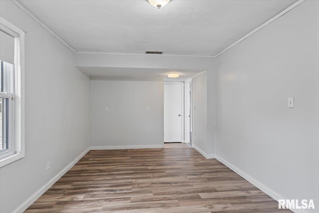 8 Melody Ln, Springfield, IL 62702 - unfurnished room with wood finished floors, crown molding, and baseboards