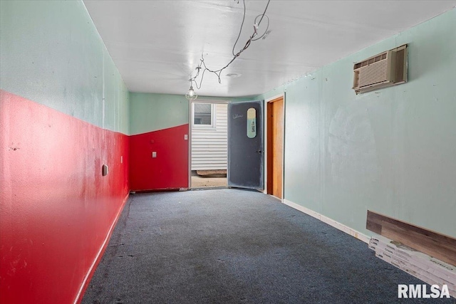 8 Melody Ln, Springfield, IL 62702 - unfurnished room featuring a wall mounted AC, carpet flooring, and baseboards