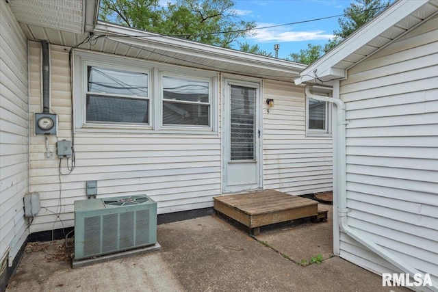 8 Melody Ln, Springfield, IL 62702 - property entrance with central AC and a patio area