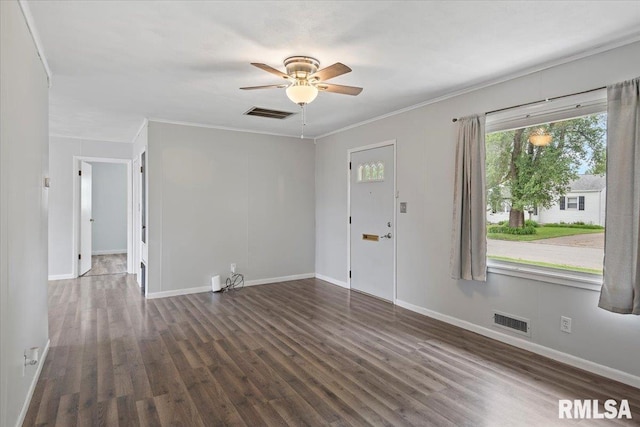 8 Melody Ln, Springfield, IL 62702 - unfurnished room with dark wood-type flooring, a ceiling fan, crown molding, and baseboards