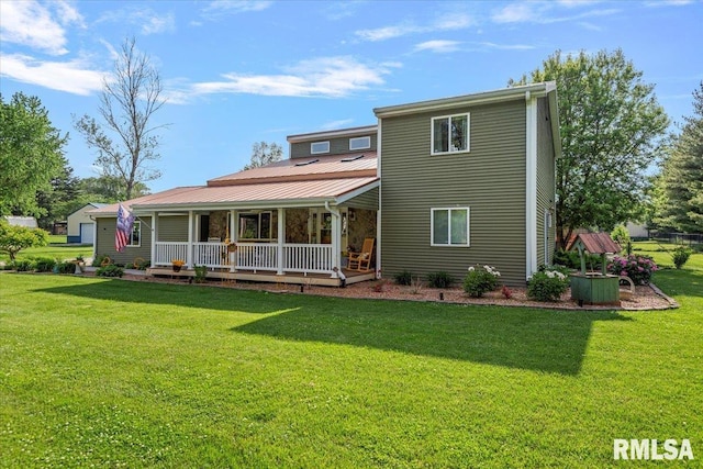 4101 N 8th St, Springfield, IL 62707 - back of property featuring a porch, a lawn, and metal roof