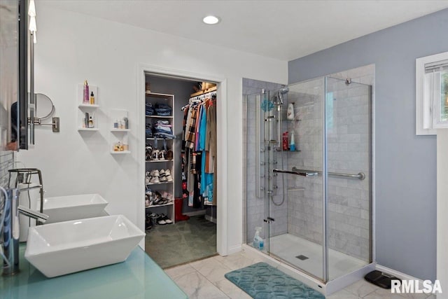 4101 N 8th St, Springfield, IL 62707 - full bath featuring a stall shower, baseboards, a walk in closet, double vanity, and recessed lighting