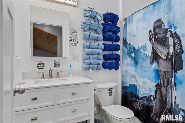 4101 N 8th St, Springfield, IL 62707 - full bathroom featuring toilet, vanity, and a shower with curtain
