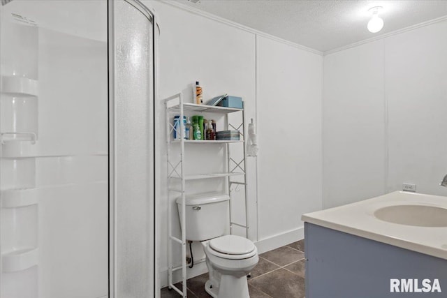 4101 N 8th St, Springfield, IL 62707 - bathroom with a stall shower, toilet, vanity, tile patterned floors, and a textured ceiling