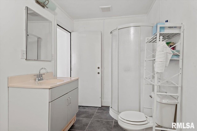 4101 N 8th St, Springfield, IL 62707 - bathroom with a stall shower, vanity, toilet, and tile patterned floors