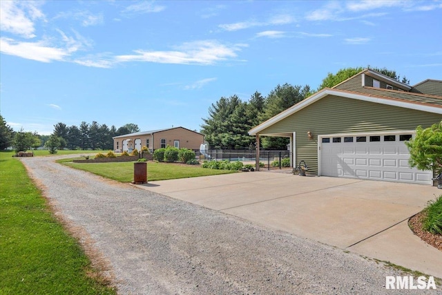 4101 N 8th St, Springfield, IL 62707 - view of property exterior featuring concrete driveway and a garage