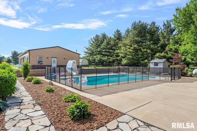 4101 N 8th St, Springfield, IL 62707 - view of swimming pool with a water slide and a patio
