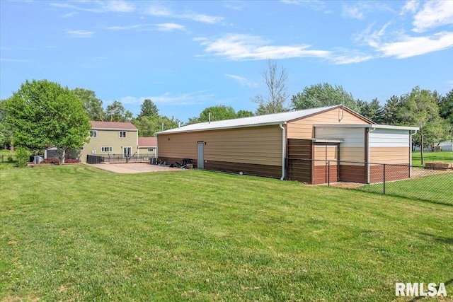 4101 N 8th St, Springfield, IL 62707 - back of house with an outbuilding and a patio