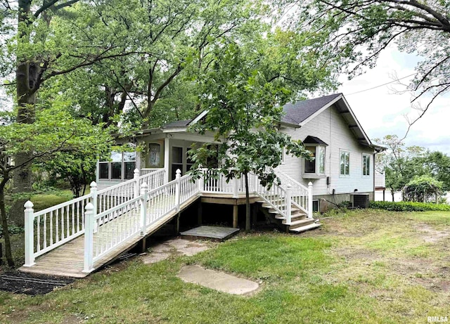 18382 N Quiver Beach Rd, Havana, IL 62644 - rear view of property with central air condition unit, stairs, a yard, and covered porch