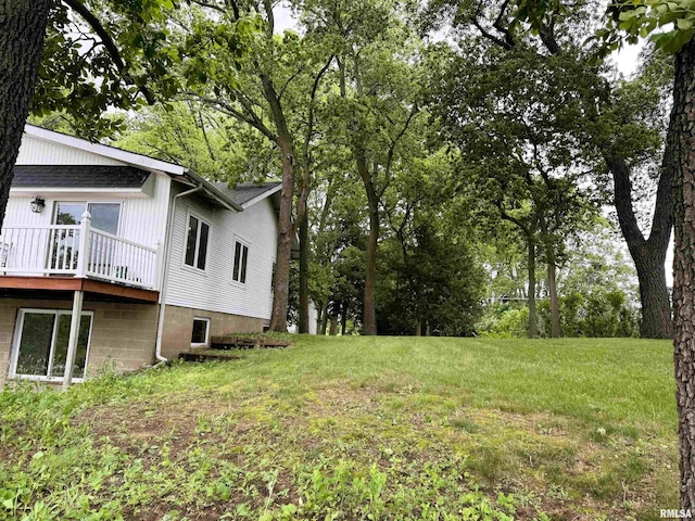 18382 N Quiver Beach Rd, Havana, IL 62644 - view of green lawn featuring a wooden deck and view of scattered trees