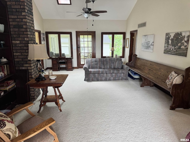 18382 N Quiver Beach Rd, Havana, IL 62644 - carpeted living area with ceiling fan and high vaulted ceiling
