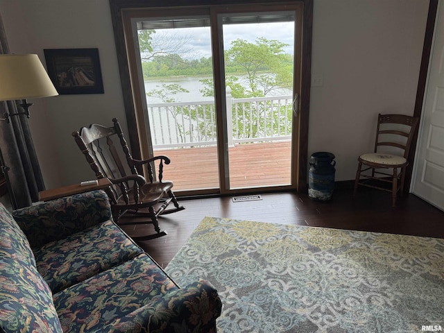 18382 N Quiver Beach Rd, Havana, IL 62644 - living area with hardwood / wood-style flooring and a water view