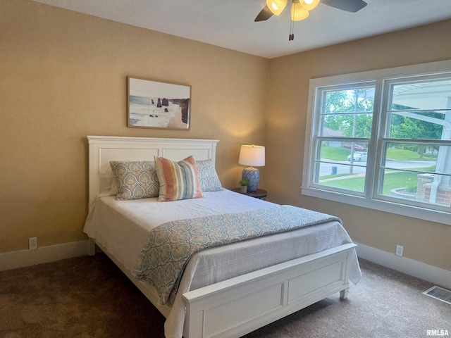 1106 S 19th St, Quincy, IL 62301 - carpeted bedroom featuring baseboards and ceiling fan