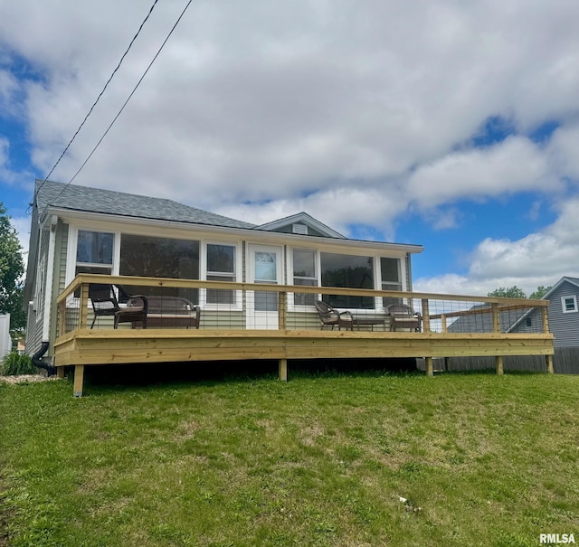 1106 S 19th St, Quincy, IL 62301 - rear view of house featuring a wooden deck, a lawn, a sunroom, and roof with shingles