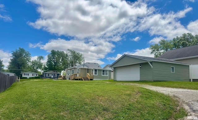 1106 S 19th St, Quincy, IL 62301 - view of yard featuring driveway and an attached garage