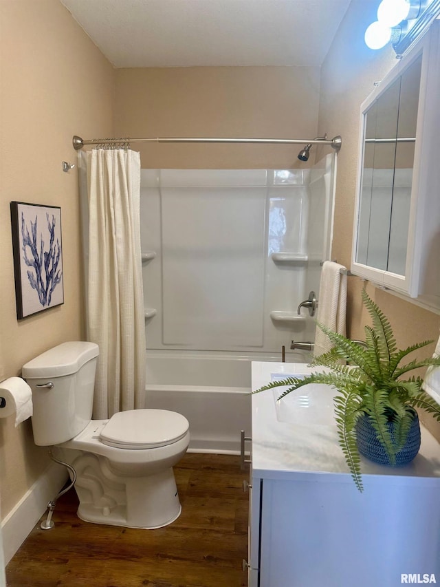 1106 S 19th St, Quincy, IL 62301 - full bathroom featuring toilet, wood finished floors, shower / tub combo, vanity, and baseboards