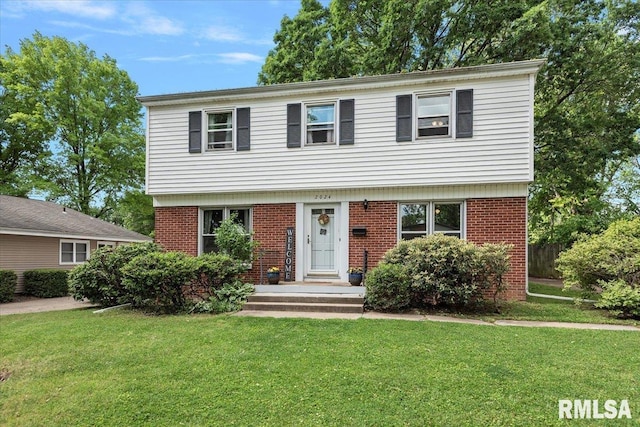 2024 Cambridge Rd, Springfield, IL 62704 - colonial home with a front lawn and brick siding