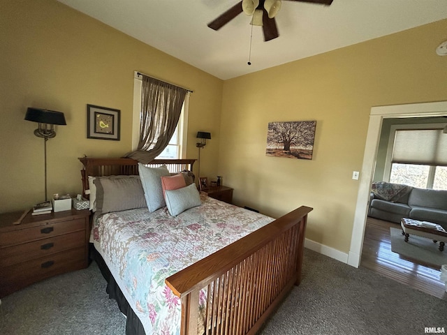 118 W Clark St, Havana, IL 62644 - carpeted bedroom featuring baseboards and ceiling fan