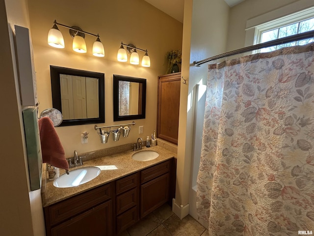 118 W Clark St, Havana, IL 62644 - full bath with tile patterned floors, double vanity, and a shower with curtain