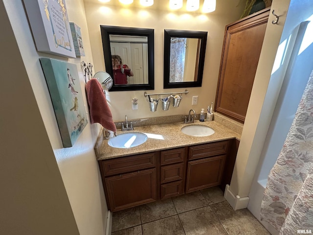118 W Clark St, Havana, IL 62644 - bathroom with tile patterned flooring and double vanity