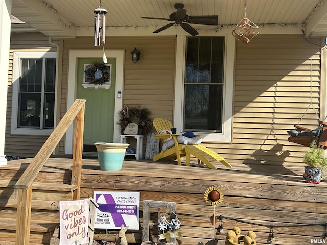 118 W Clark St, Havana, IL 62644 - view of exterior entry featuring a ceiling fan and a porch