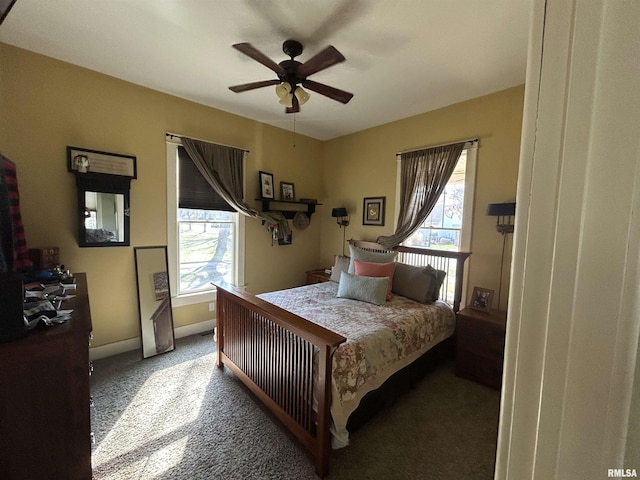 118 W Clark St, Havana, IL 62644 - carpeted bedroom with ceiling fan and baseboards