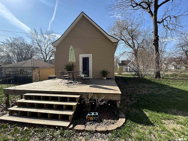 118 W Clark St, Havana, IL 62644 - back of house featuring a wooden deck, a yard, and outdoor dining space