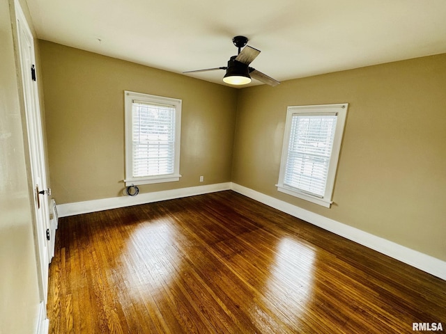 1595 N Kellogg St, Galesburg, IL 61401 - spare room with hardwood / wood-style floors, baseboards, and ceiling fan