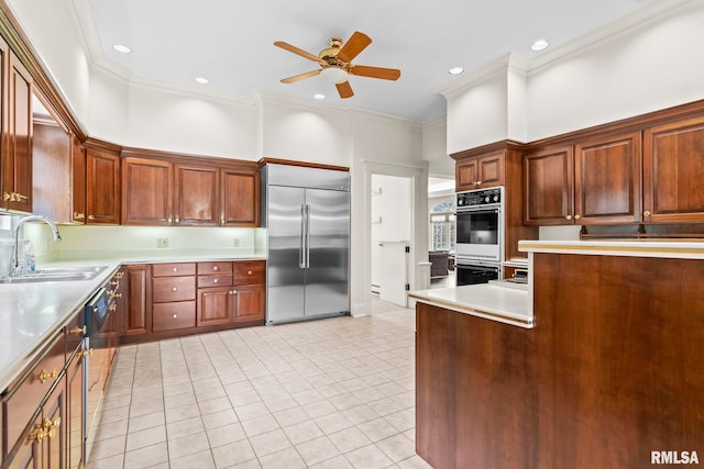 1044 Williams Blvd, Springfield, IL 62704 - kitchen with built in refrigerator, double oven, a sink, crown molding, and a ceiling fan