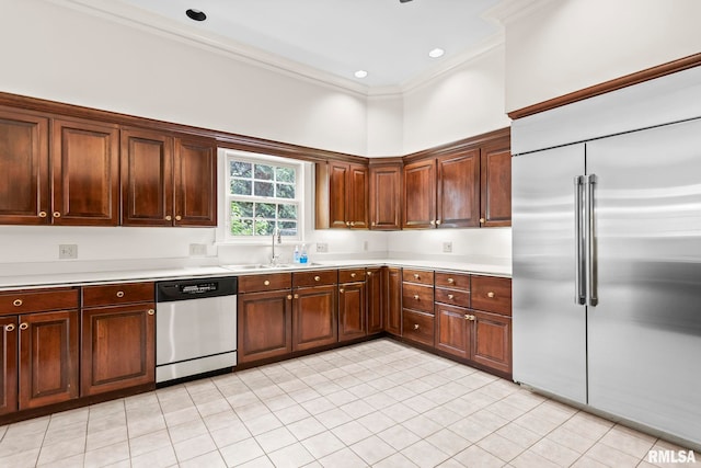 1044 Williams Blvd, Springfield, IL 62704 - kitchen with appliances with stainless steel finishes, a sink, light countertops, light tile patterned floors, and crown molding