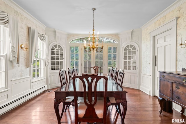 1044 Williams Blvd, Springfield, IL 62704 - dining room featuring wallpapered walls, baseboard heating, a chandelier, hardwood / wood-style floors, and a decorative wall