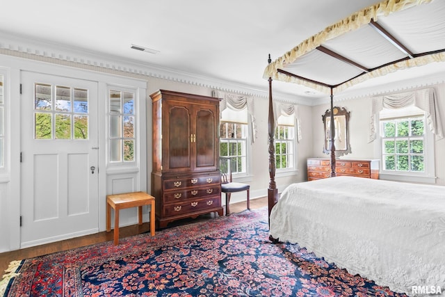 1044 Williams Blvd, Springfield, IL 62704 - bedroom with crown molding and dark wood-style floors