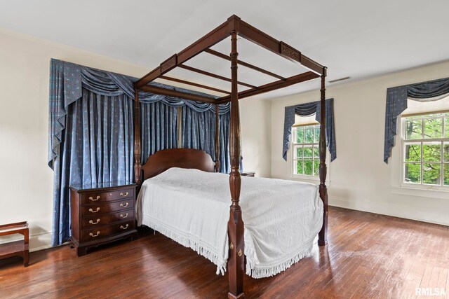 1044 Williams Blvd, Springfield, IL 62704 - bedroom featuring multiple windows, wood finished floors, baseboards, and ornamental molding