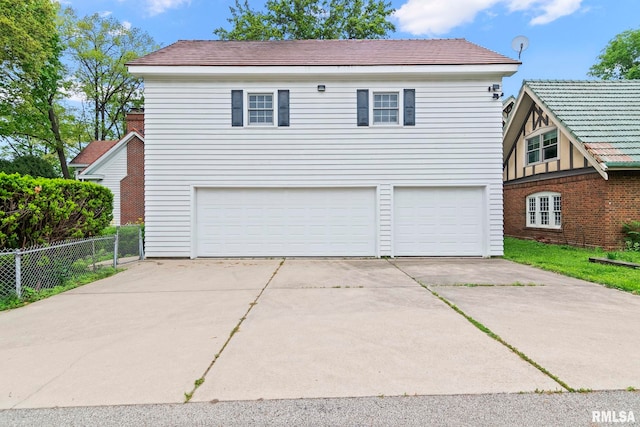 1044 Williams Blvd, Springfield, IL 62704 - view of front of property with a garage and driveway