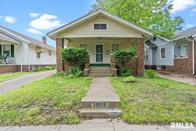 1708 Holmes Ave, Springfield, IL 62704 - view of front of property with a porch and brick siding