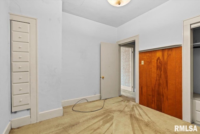1708 Holmes Ave, Springfield, IL 62704 - unfurnished bedroom with carpet flooring and baseboards